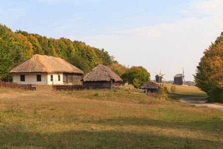 Old houses of the peasants and mill at the Museum of Pirogovo. Ukraineの写真素材