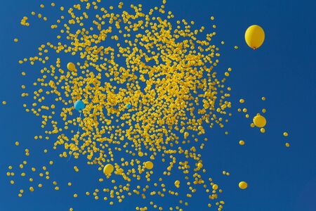 Flies in the sky yellow balls. Abstract background
