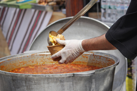 Cook poured hot soup into a pot of dough. Foodの写真素材