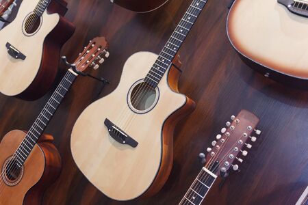 Classical acoustic guitars in musical store. Music