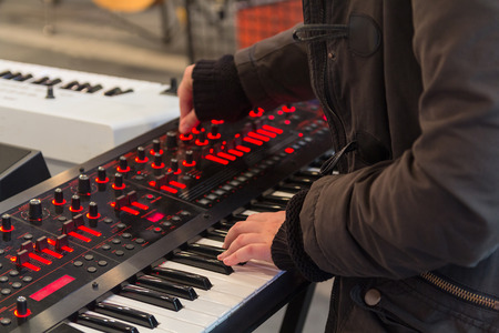 Herb musician playing the synthesizer. Musical instrumentsの写真素材