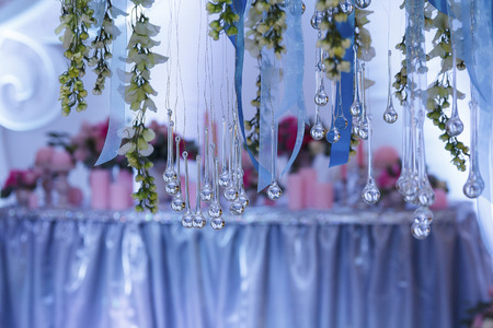Decorationof the banquet hall at a wedding ceremony in the evening lightの写真素材
