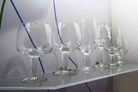 Glass wine glasses in a shopping pomschenii. Saleの写真素材