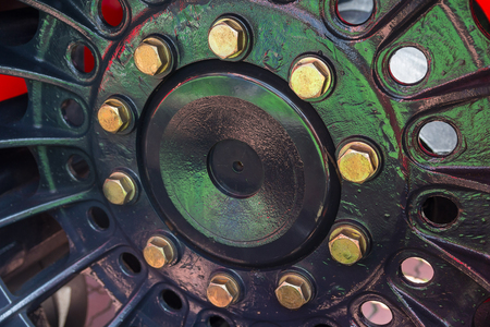 Bolts on the tractor wheel closeup. Industryの写真素材
