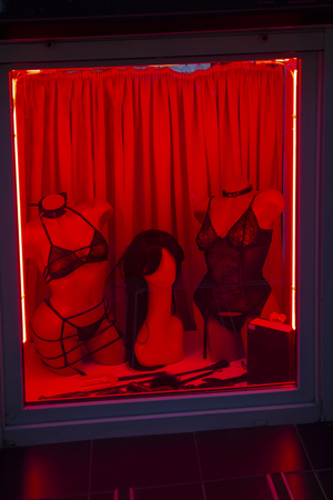 Showcase sex shop in the evening lightの写真素材