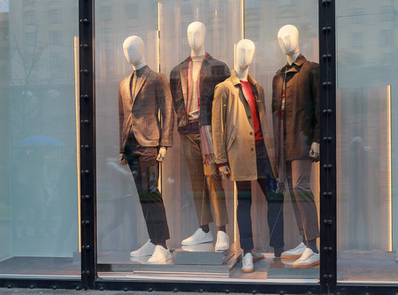 Men's mannequins in the window of a luxury storeの写真素材