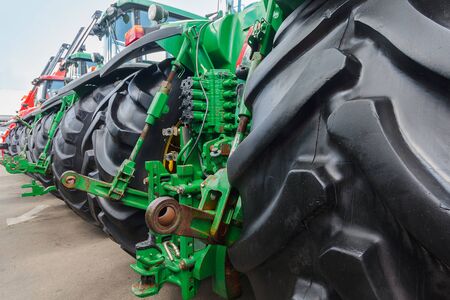 Agricultural tractors lined up in a row. Industryの写真素材