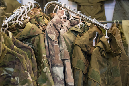 Samples camouflage military clothes in the storeの写真素材