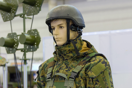 Dummy in army helmet with headphones. Armamentの写真素材