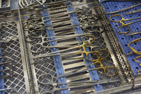 Variety of surgical instruments on the counter. Medicine
