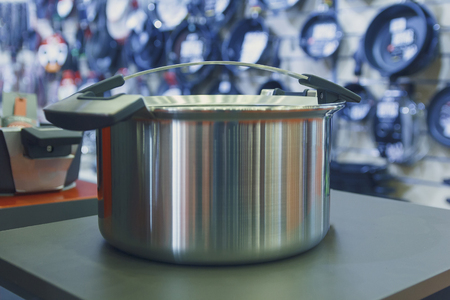 Stainless steel pot on the store shelf. Retail salesの写真素材