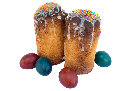 Easter cakes and eggs on white background