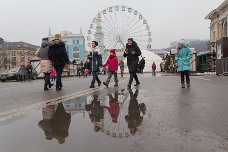 Kiev, Ukraine - January 28, 2018: People walk on Kontraktova square in the new year's eveのeditorial素材