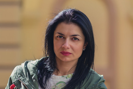Portrait of the serious woman in the street. Peopleの写真素材