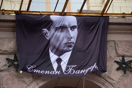 Kiev, Ukraine -October 14, 2017: Portrait of Ukrainian politician, ideologist and theorist of Ukrainian nationalism Stepan Bandera at the City Hall building on the day of the defender of the fatherland.のeditorial素材
