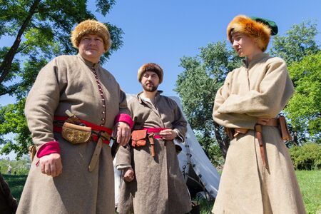 Kiev, Ukraine - May 27, 2018: Men in costumes of Cossacks at the festival of historical reconstructionのeditorial素材