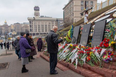 Kiev, Ukraine - February 20, 2019: People commemorate those killed during the revolution and dignity at the memorial on Institutskaya Street on the fifth anniversary of the eventsのeditorial素材