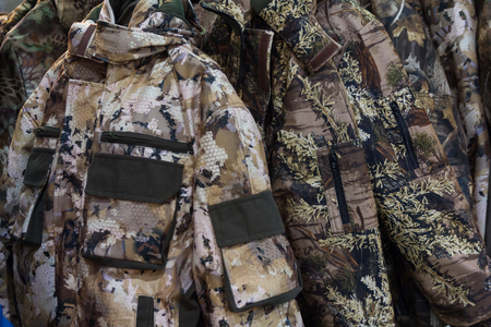 Samples camouflage military clothes in the storeの写真素材