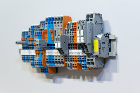 Terminals, contactors, relays, switches on the wall. Electrical componentsの写真素材