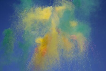 Day fireworks made of colored smoke. Holidays