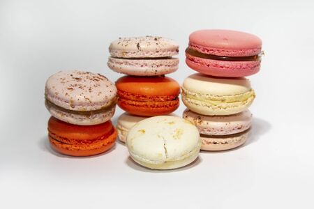 Colorful macaroni cakes on white background. Dessert