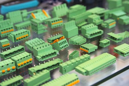 Terminals, contactors, relays, switches on the stand. Electrical components