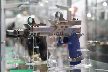 Guns on a show-window of shop. Weaponの写真素材