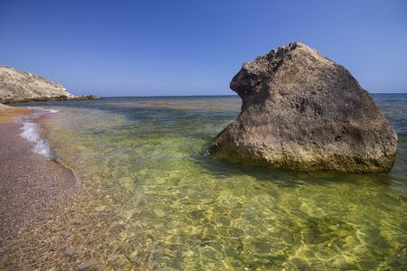 Seascape at a rocky beach. Black Sea in Crimea