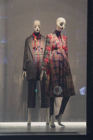Female mannequin in a shop window. Fashion and salesの写真素材