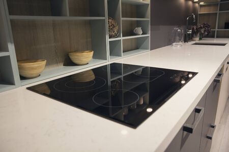 Modern electric stove in the kitchen area interere closeupの写真素材