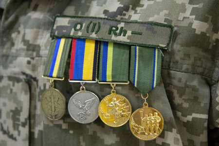 Kiev, Ukraine - May 08 2019: Medals Ukrainian soldiers - members of the antiterrorist operation in the eastのeditorial素材