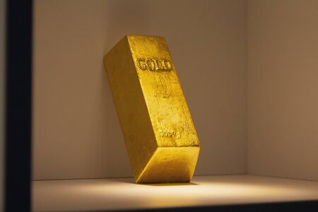 Layout of gold bullion on a shelfの写真素材
