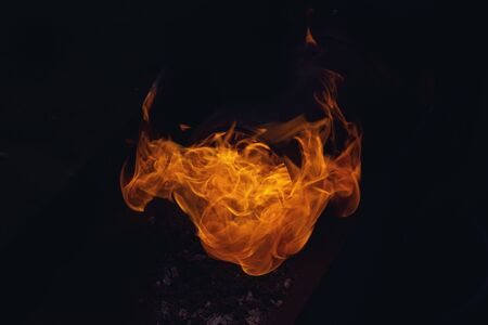 Burning flame or fire isolated on black backgroundの写真素材
