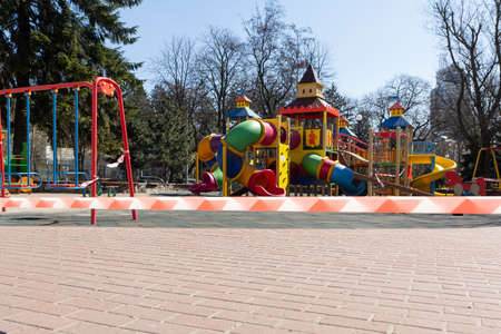 Kiev, Ukraine -April 06, 2020: Closed outdoor playground. Coronavirus social distance quarantineのeditorial素材