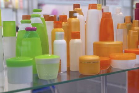 Set of common plastic bottles for household chemistry and cosmetics on a stackの写真素材