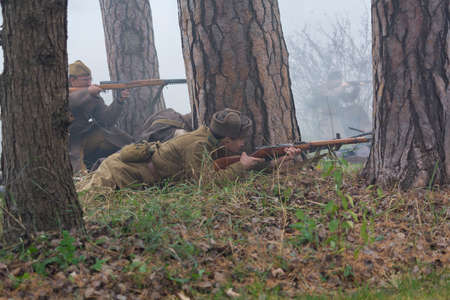 Vorzel, Ukraine - November 03, 2019: People in uniform of fighters of the Red Army of World War II conduct a battle at historical reconstructionのeditorial素材