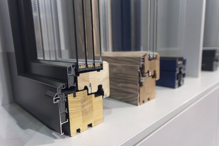 Wooden and aluminum profile for window, doors in the dealer's exhibition hallの写真素材