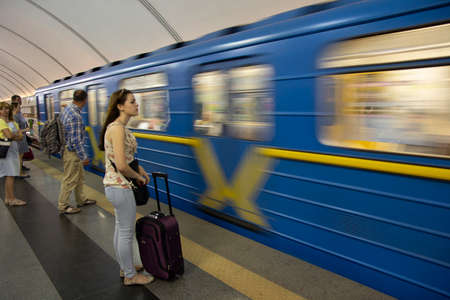 Ukraine, Kiev - June 09, 2016: Passengers on underground metro station platformのeditorial素材