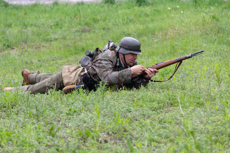 Kiev, Ukraine - May 9, 2019: Men in the form of Wehrmacht soldiers during a battle showdown at the...