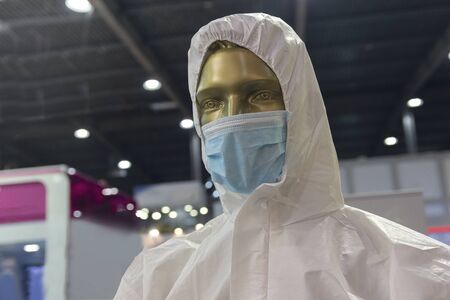 Mannequin with a protective mask and anti-chemical and antibacterial equipment. Medicine and Researchの写真素材