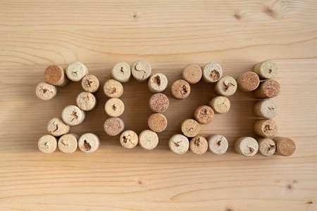 Wine corks stacked as the date of the 2020 retro style. Christmas backgroundの写真素材