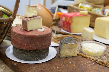Craft cheese on the farmer's market counterの写真素材