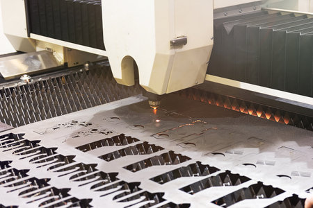 Laser CNC machine cutting of sheet metal. Industryの写真素材