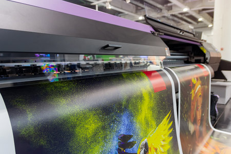 Large format printing machine in operation. Industry