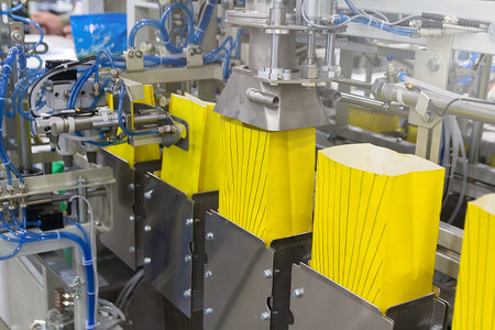 Production line in the food industry for packaging bulk products in paper bags. Food industryの写真素材