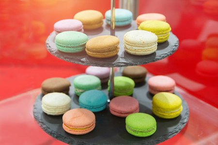 Rack with colorful fresh macaroons cookies. Sweets, dessertの写真素材