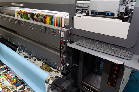 Large format printing machine in a printing house. Industry