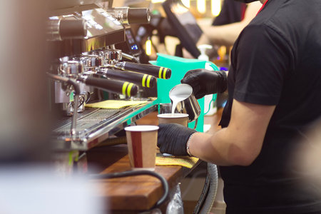 Barista is making a coffee in cafe shop. Food and drink