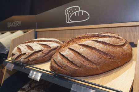 Fresh organic bread in the shop window. Foodの写真素材