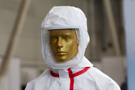 Mannequin in protective overalls for painting and repair work. Industry